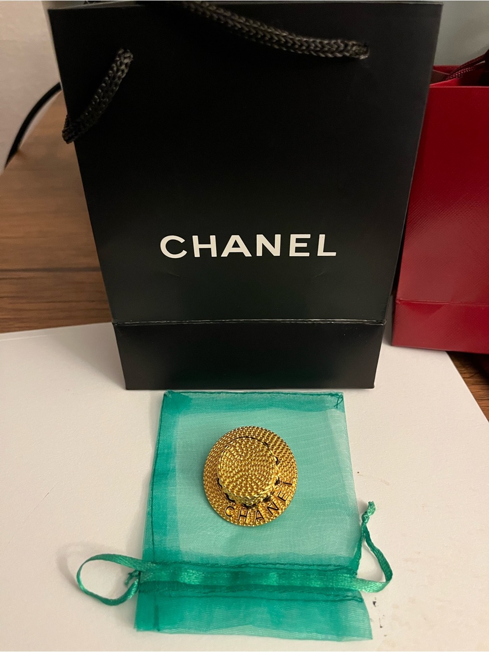 CHANEL Gold-Tone Textured Hat Motif Brooch with Original tiny Chanel bag